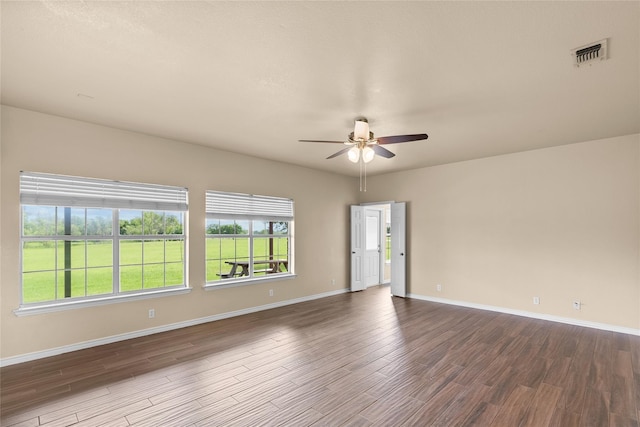 unfurnished room featuring hardwood / wood-style flooring and ceiling fan