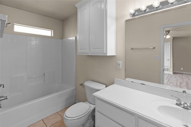 full bathroom with ceiling fan, tile patterned flooring, vanity, bathtub / shower combination, and toilet