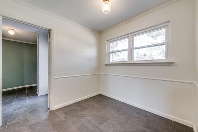 unfurnished room with ornamental molding