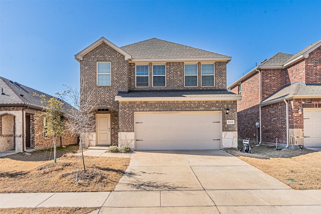 front of property featuring a garage