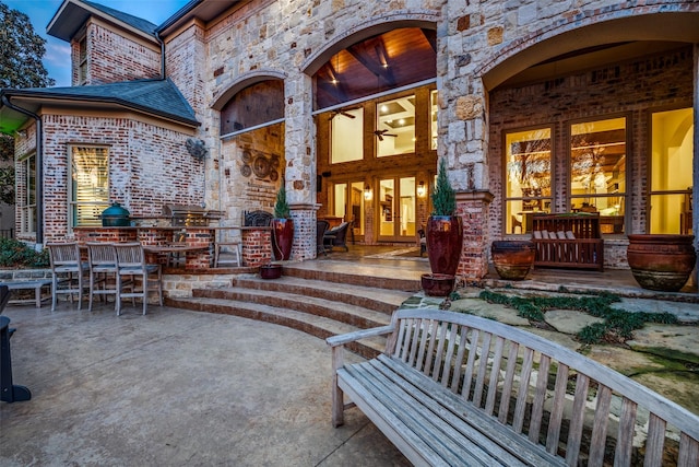 view of patio / terrace featuring a ceiling fan