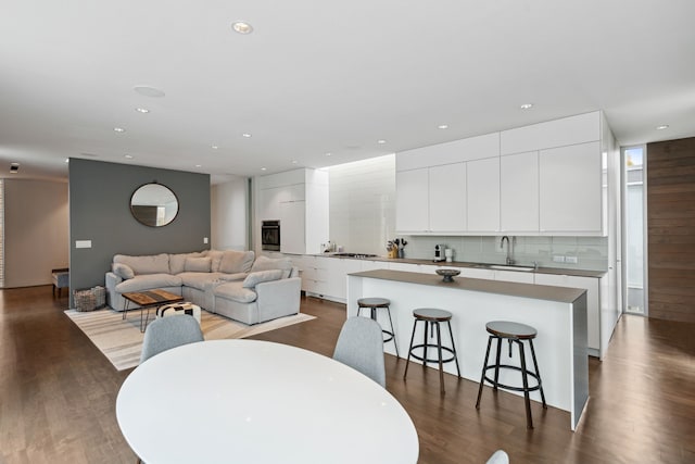 interior space with hardwood / wood-style flooring and sink