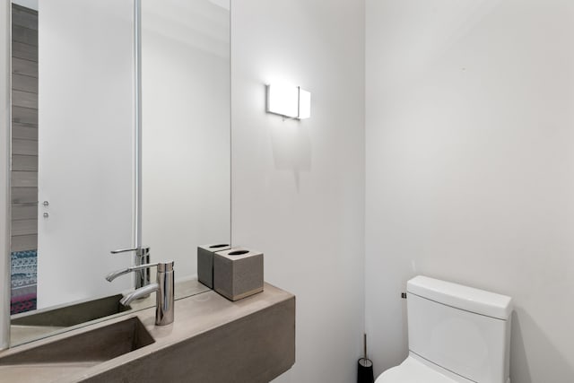 bathroom with sink and toilet