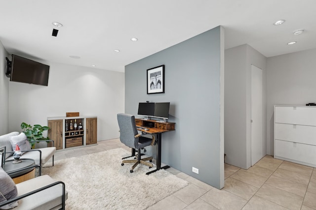 office area with light tile patterned floors