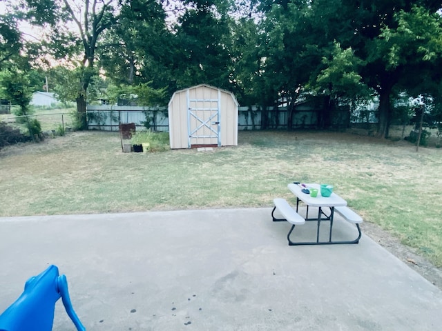 view of patio featuring a shed