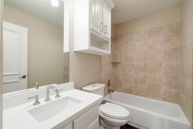 full bathroom with vanity, toilet, and tiled shower / bath