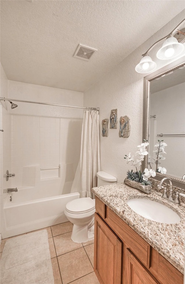 full bathroom featuring toilet, a textured ceiling, vanity, shower / bathtub combination with curtain, and tile patterned flooring