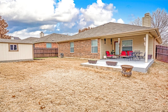 rear view of property with a patio