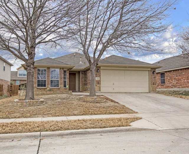 ranch-style home featuring a garage