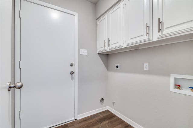 laundry room featuring dark wood-type flooring, cabinets, washer hookup, and electric dryer hookup