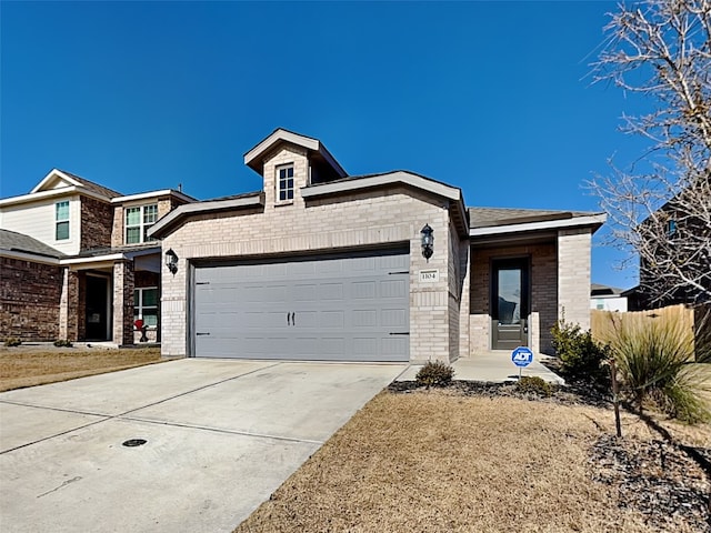 view of front of property featuring a garage