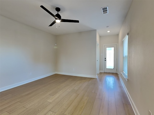 interior space featuring ceiling fan and light wood-type flooring