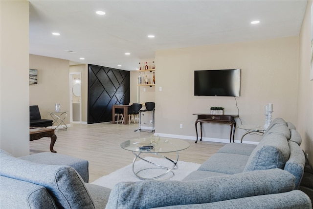 living room with light hardwood / wood-style floors