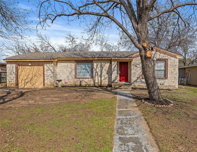 ranch-style house featuring a garage and a front lawn