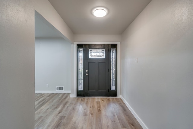 foyer featuring light hardwood / wood-style flooring