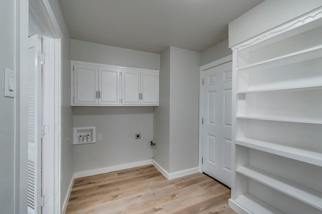 laundry area featuring cabinets, hookup for an electric dryer, light hardwood / wood-style floors, and hookup for a washing machine