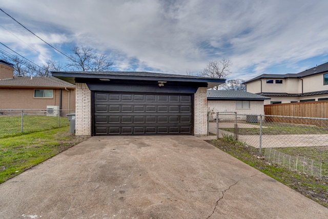 garage with a lawn