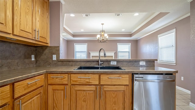 kitchen with sink, backsplash, stainless steel dishwasher, light tile patterned floors, and a raised ceiling