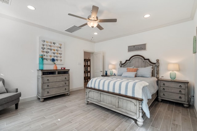 bedroom featuring ornamental molding and ceiling fan