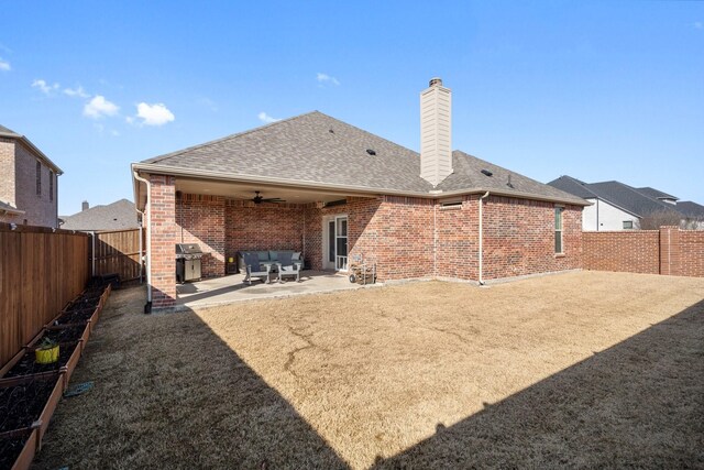 view of patio with a grill and ceiling fan