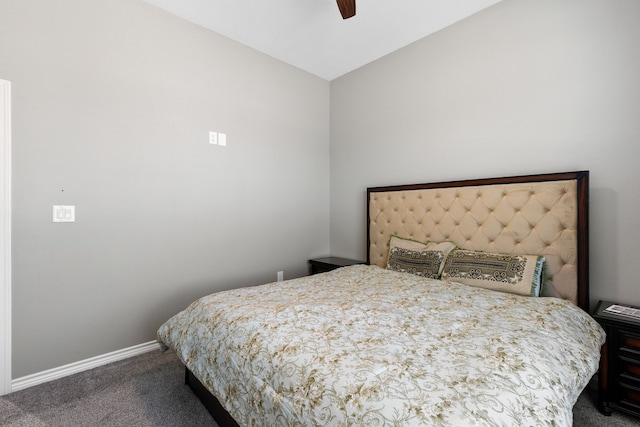 carpeted bedroom with vaulted ceiling and ceiling fan