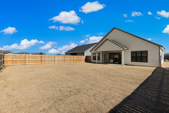 back of house with a patio area