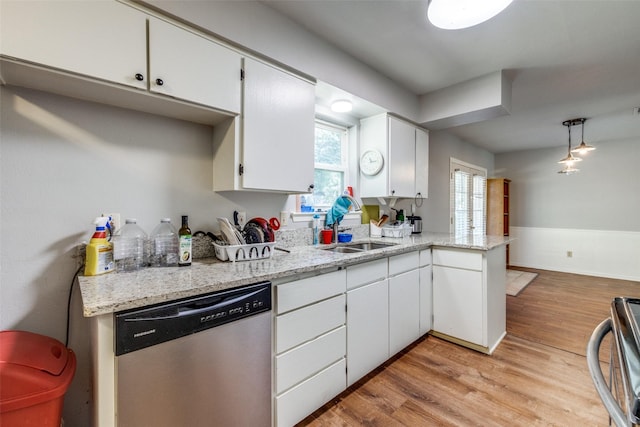 kitchen with white cabinetry, dishwasher, sink, range, and light wood-type flooring