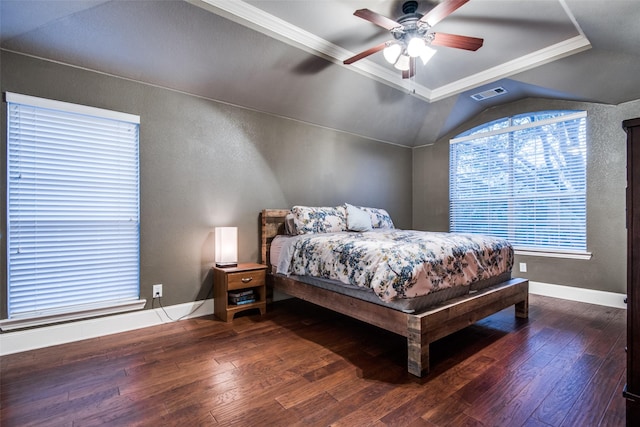 bedroom with dark wood-type flooring, ceiling fan, crown molding, and vaulted ceiling