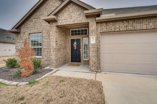 property entrance with a garage