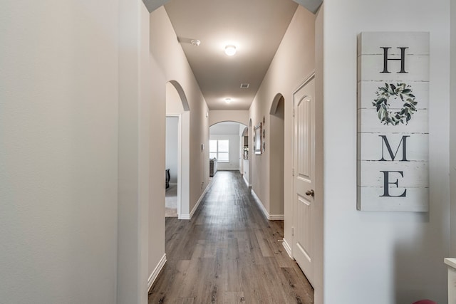 hallway featuring light wood-type flooring