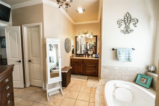 bathroom with a relaxing tiled tub, vanity, crown molding, and tile patterned flooring