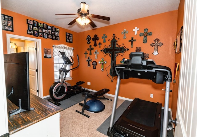 exercise room featuring ceiling fan