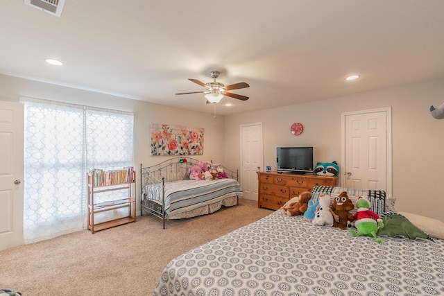 bedroom featuring light carpet, access to outside, and ceiling fan