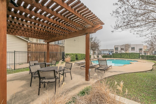 view of pool with a patio and a pergola