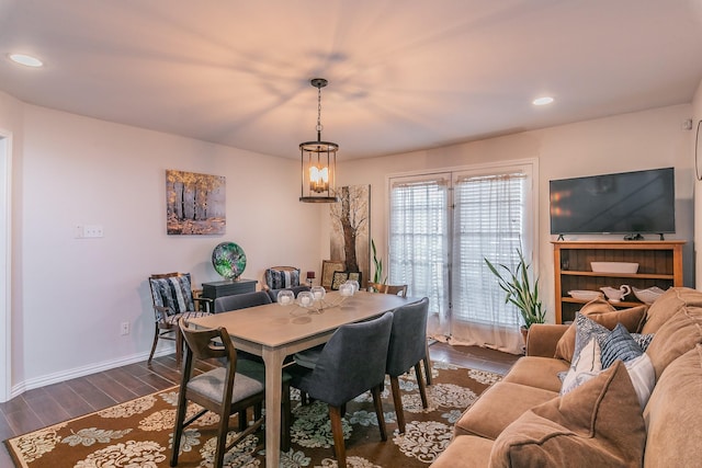 dining area with dark wood-type flooring