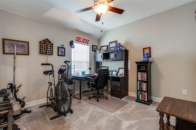 carpeted office space featuring ceiling fan and lofted ceiling