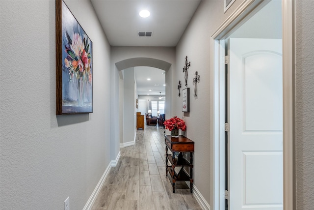 hall featuring light hardwood / wood-style floors