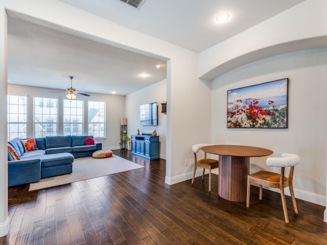 interior space with dark hardwood / wood-style flooring and ceiling fan