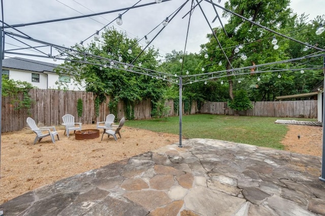 view of patio featuring a fire pit