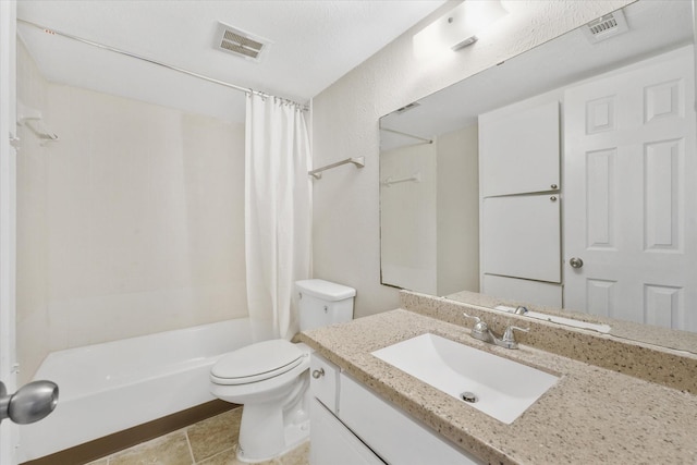 full bathroom with tile patterned floors, vanity, toilet, and shower / bath combo