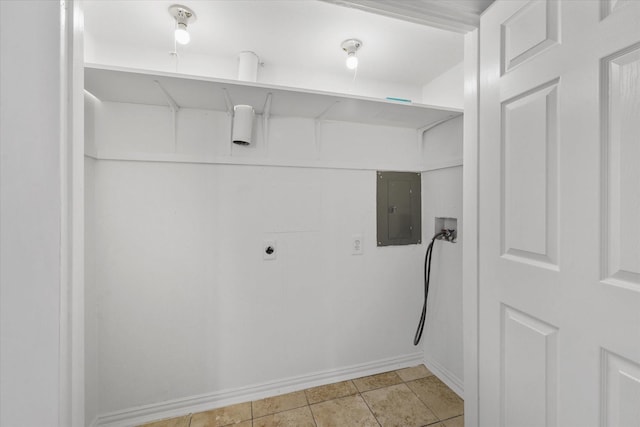 laundry area featuring washer hookup, electric panel, electric dryer hookup, and light tile patterned flooring