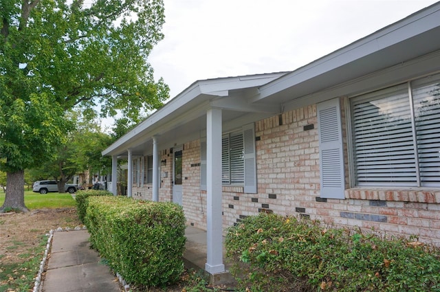 view of home's exterior featuring covered porch