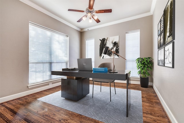 office featuring dark wood-type flooring, crown molding, baseboards, and ceiling fan