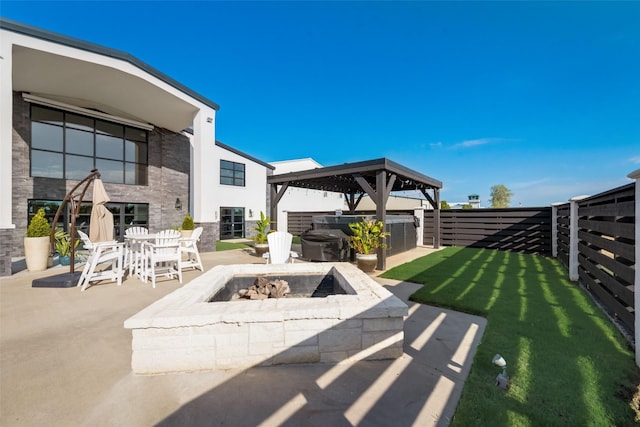 view of patio featuring a gazebo and a fire pit