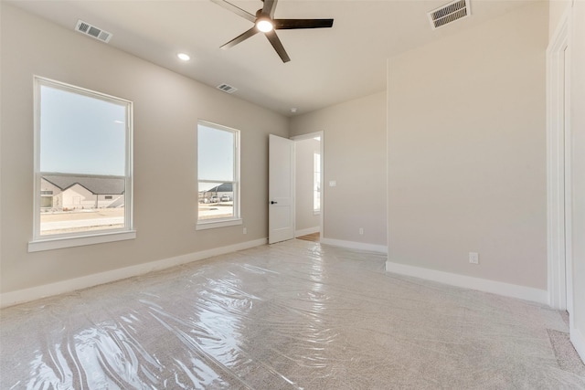 empty room featuring ceiling fan