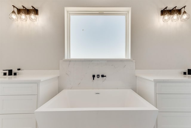 bathroom featuring a healthy amount of sunlight and a washtub