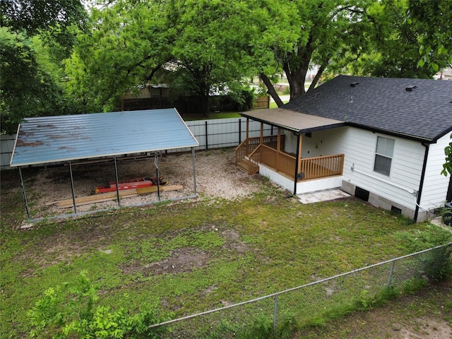 view of yard with a deck