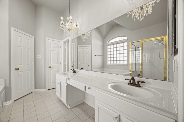 bathroom with lofted ceiling, tile patterned floors, vanity, a notable chandelier, and plus walk in shower