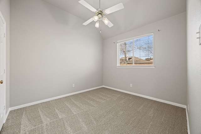 carpeted empty room with lofted ceiling and ceiling fan