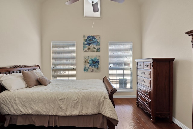 bedroom featuring dark wood-type flooring and ceiling fan